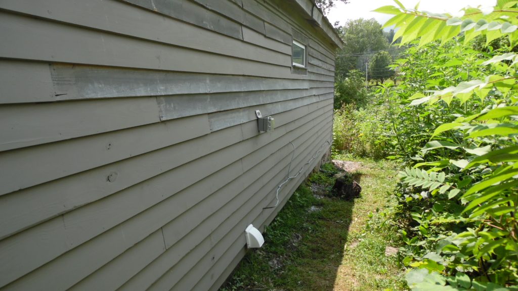 Back of bathhouse with new RV power box and new dryer vent Back of bathhouse with new RV power box and new dryer vent