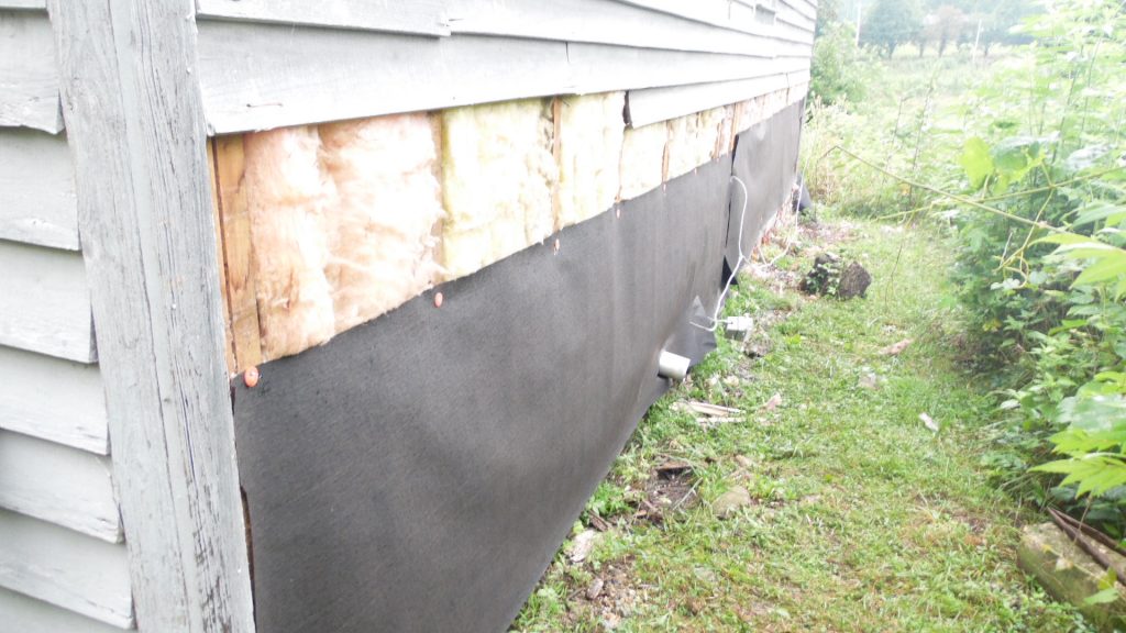 First order of business - new insulation and asphalt paper First order of business - new insulation and asphalt paper.